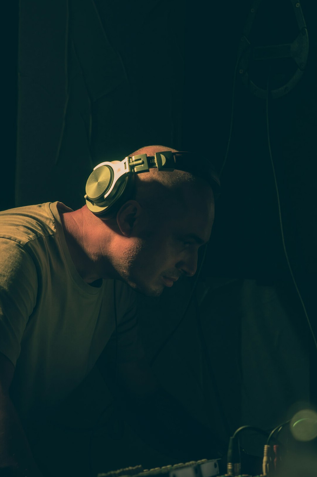 Portrait of a sound engineer wearing studio headphones